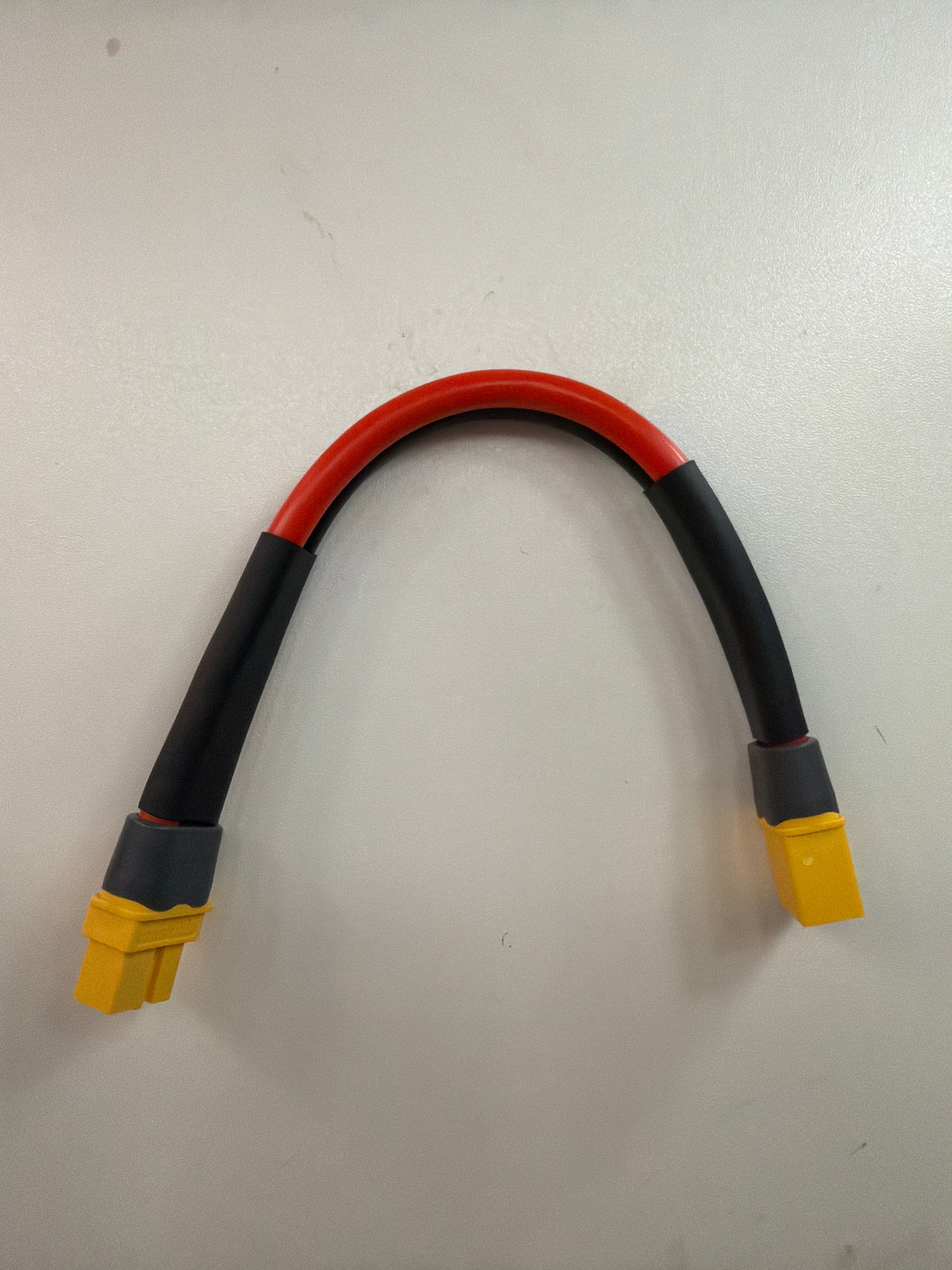Extended cord for battery panel